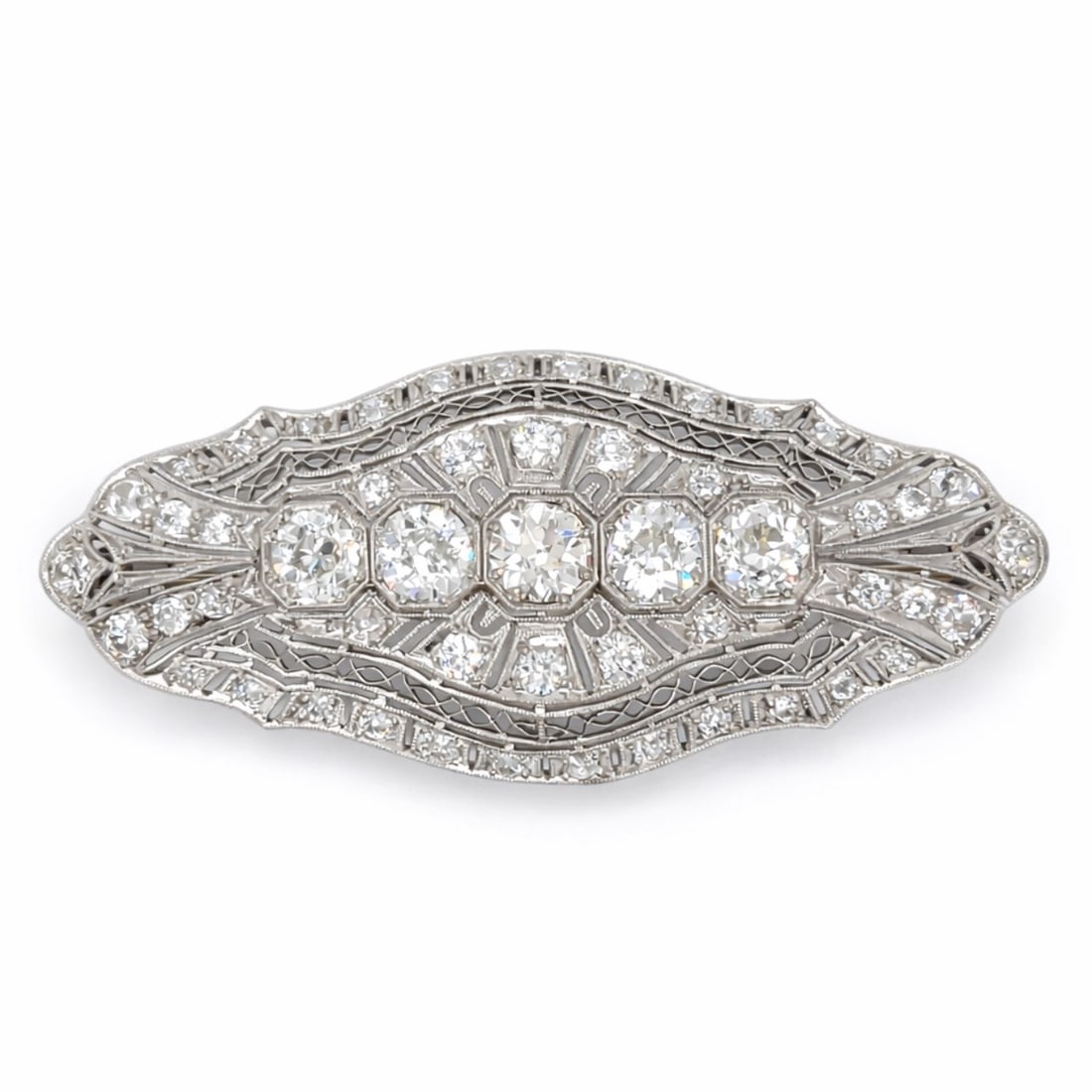Art Deco Platinum 5.70 Ct. Diamond Brooch: Original Art Deco; Heavy Platinum mounting; 5.70 Ct. total weight in high-grade white diamonds.