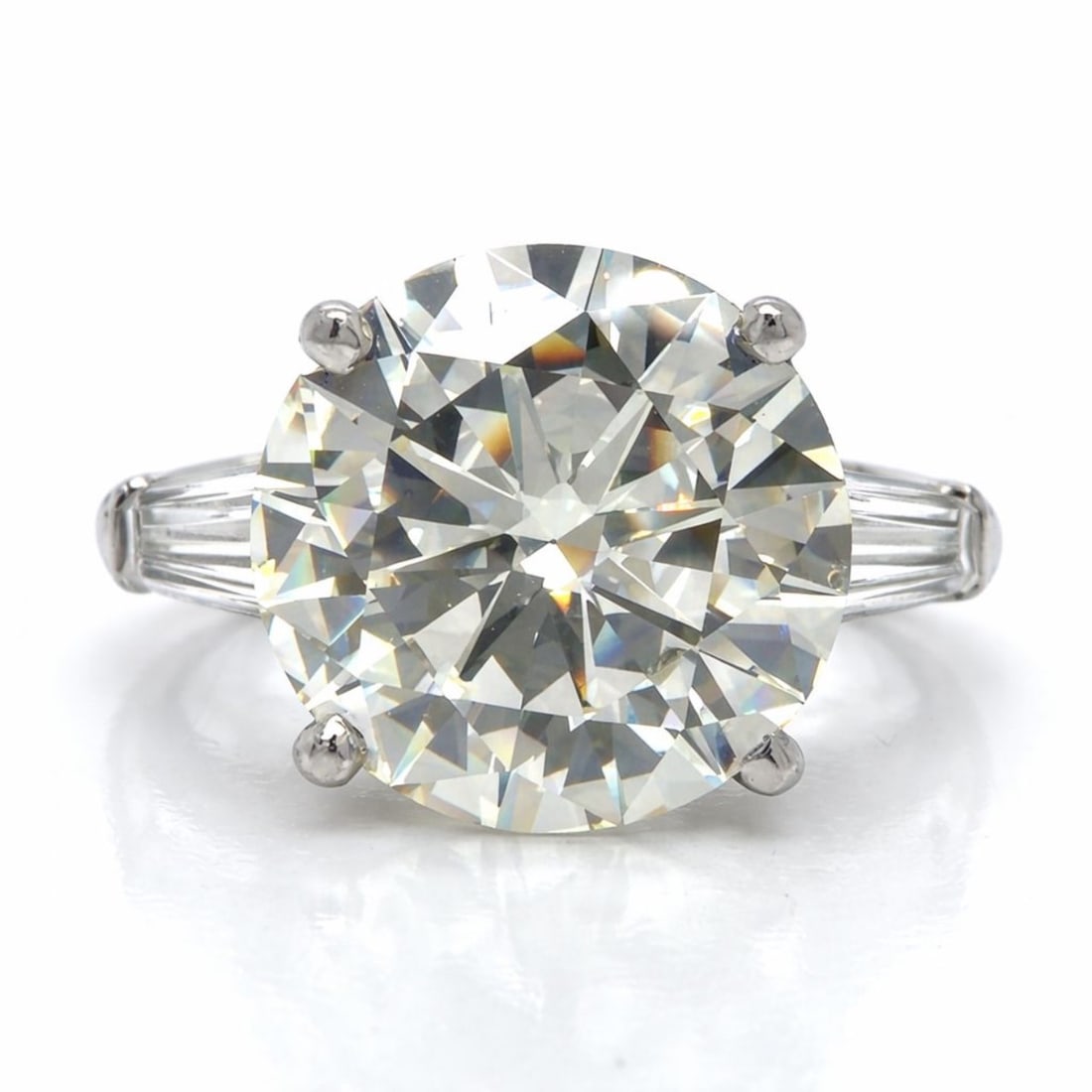 Art Deco Platinum 6.97 Ct. Diamond Ring: Major original Art Deco estate ring; Solid Platinum; Outstanding 6.97 Ct. diamond center piece.