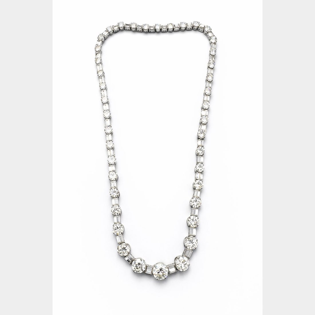 Art Deco Platinum Diamond Necklace/Bracelets: Ultra-rare convertible estate set; Platinum Art Deco diamond line wearable as a full necklace or split bracelets.