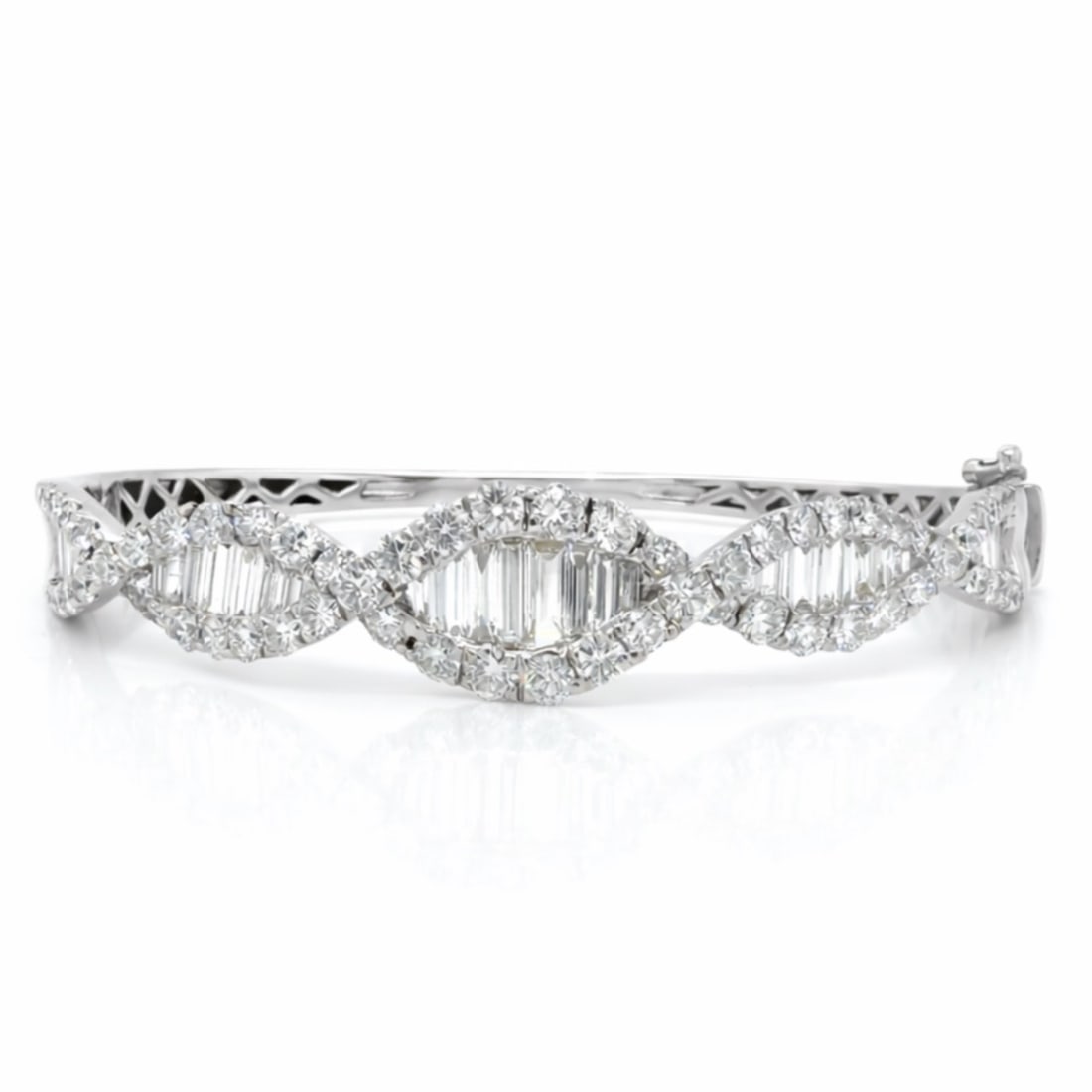 18K White Gold 6.50 Ct. Diamond Bangle: 18K White Gold structured statement bangle; High-grade white diamonds totaling 6.50 Ct.