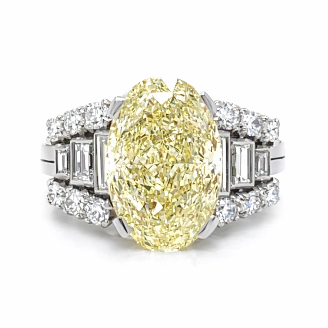 Plat/18K GIA Certified 5.03 Ct. Oval Diamond Ring: Solid Platinum setting with 18K details; GIA Certified monumental 5.03 Ct. Oval cut diamond center.