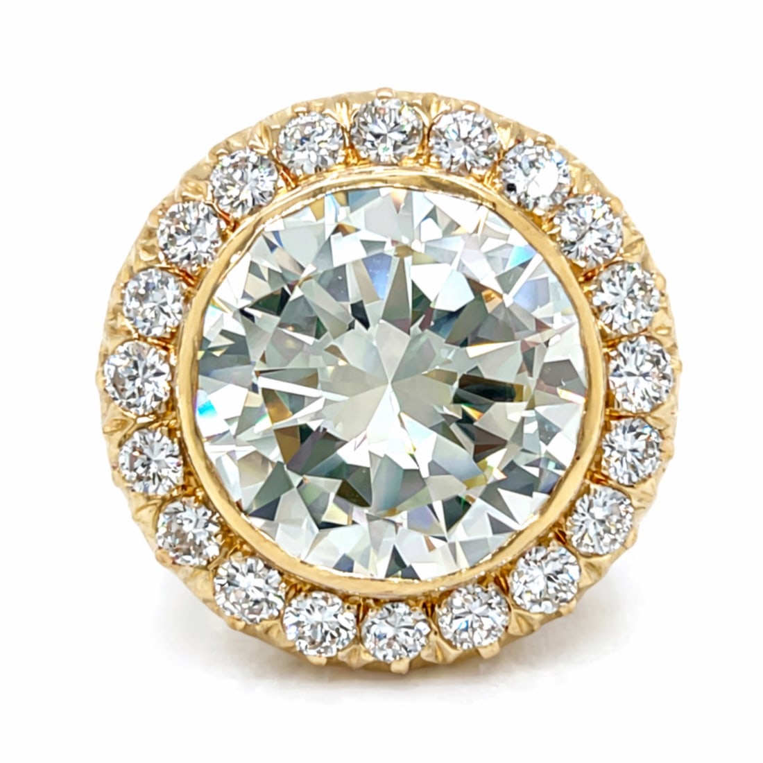 18K YG GIA Certified 10.01 Ct. Diamond Ring: High-Jewelry Investment; 18K Yellow Gold; GIA Certified monumental 10.01 Ct. diamond centerpiece.