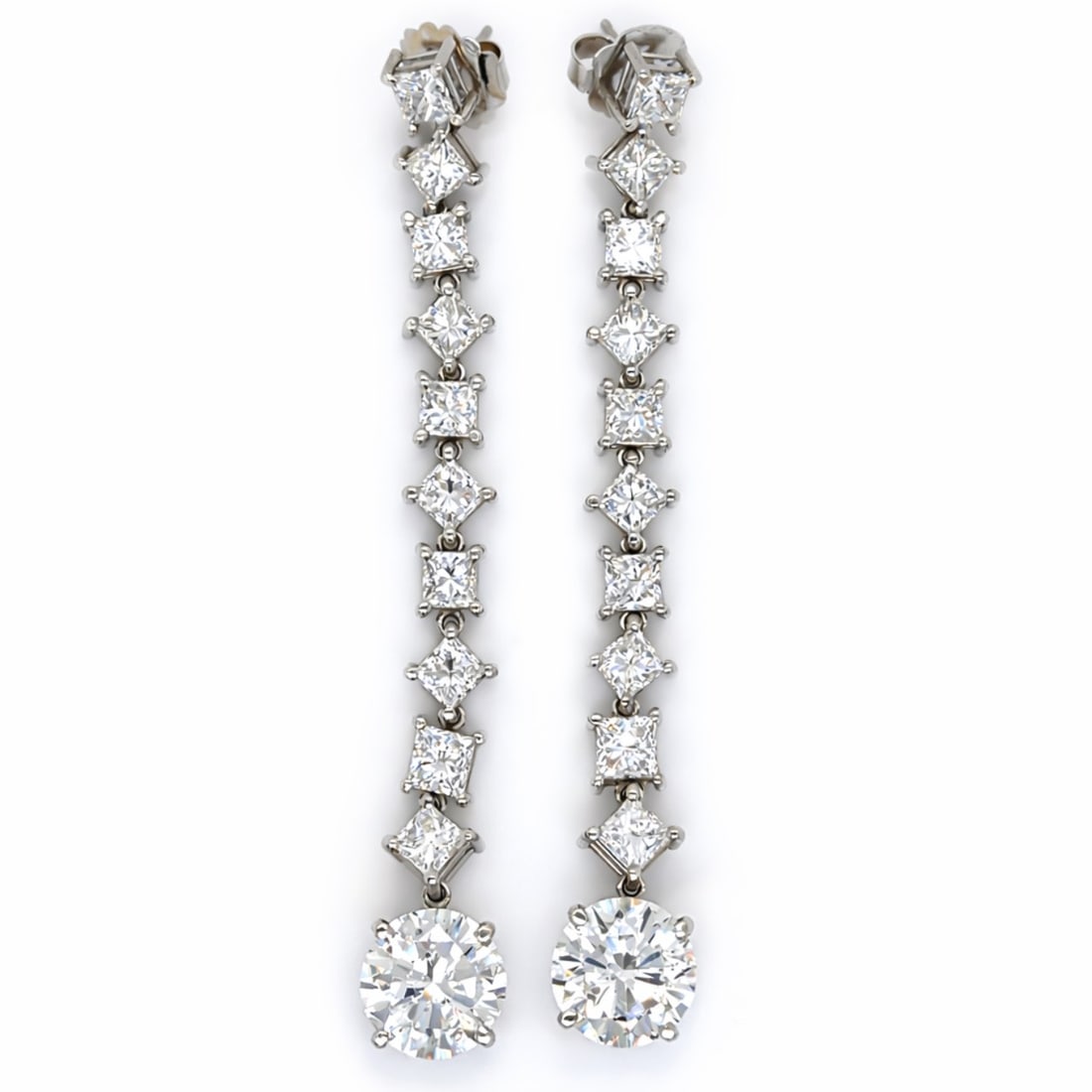 Platinum 20.84 Ct. Diamond Earrings: Ultra-luxury heavy Platinum settings; Cascade drops holding an incredible 20.84 Ct. of diamonds.