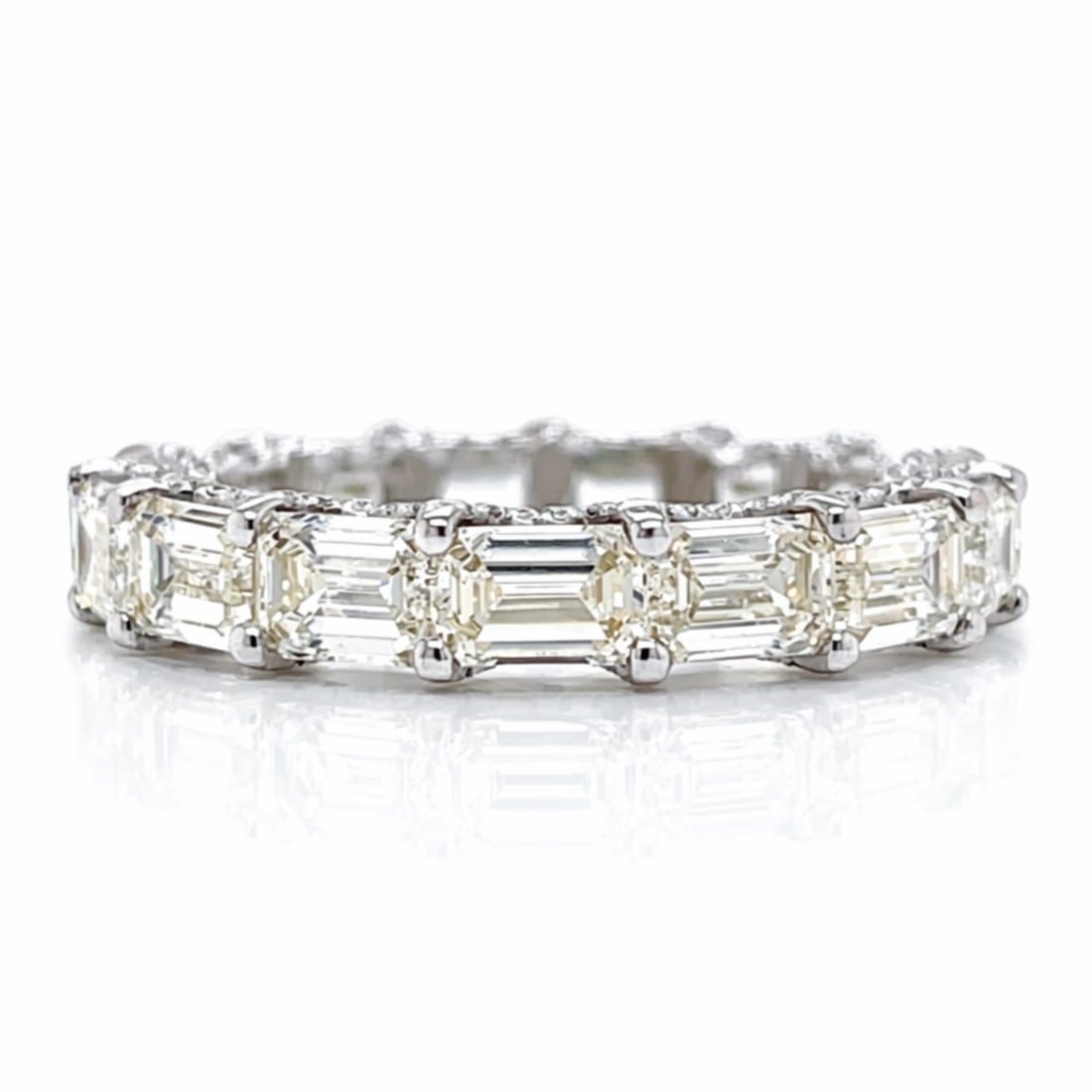 18K WG 11.50 Ct. Men's Eternity Band: Bold 18K White Gold wide profile; Full eternity layout holding a massive 11.50 Ct. of large diamonds.
