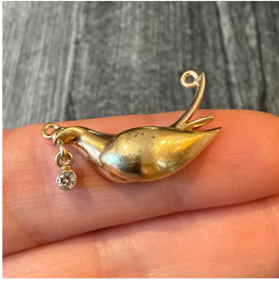 Dove Pendant Part with a Diamond in 14K Gold: Exquisite, unique antique estate find. Features a stylized solid 14K yellow gold bird in flight with an extended suspension loop holding a single bead-set old European cut white diamond drop accent. D