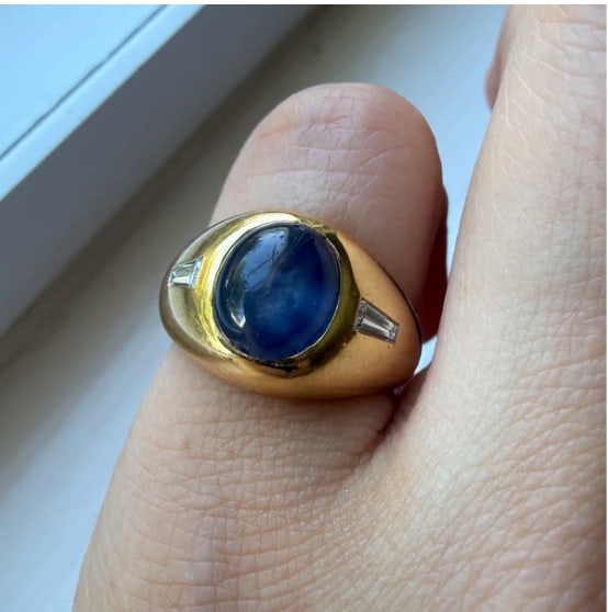 Cabochon Sapphire and Diamond Dome Ring in 18K Gold (W): Masterpiece cocktail statement ring featuring a deep blue oval cabochon natural sapphire (approx 4.80 cts) flush-mounted at the center of a heavy 18K yellow gold pave dome encrusted with tiered rows o