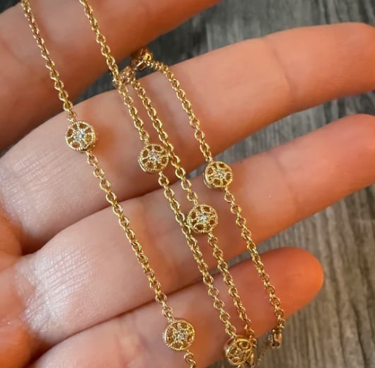 Diamond Station and 14K Gold Chain, 18" Long (S): High-fashion "Diamonds by the Yard" style layering chain. Fine diamond-cut cable links interspersed with 5 evenly spaced, bezel-set bright brilliant round white diamonds totaling approximately 0.25