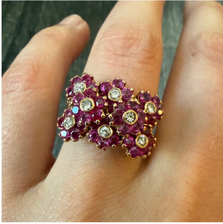 Ruby and Diamond Flower Bouquet Ring in 14K Gold: Retro cluster asymmetrical cocktail ring forming an abundant blooming flower spray bundle. Features 6 bright marquise-cut natural red rubies (approx. 0.90 ctw) forming floral petals arranged around cl