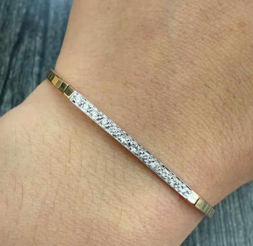 Light Catching Diamond and 14K Gold Square Link Bracelet: Modern geometric line bracelet consisting of squared, hollowed structural box links. The top facets are diamond-cut for maximum light reflection and set with accent diamonds (approx. 0.20 ctw). Hidden