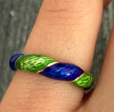 Vintage Blue and Green Enamel Twist Band in 14K Gold: Mid-century eternity style wedding or stacking band featuring a continuous twisted rope design inset with alternating channels of rich royal blue and kelly green vitreous hot enamel. Band width: 4.2 m