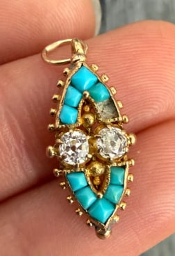 Victorian Diamond and Turquoise Navette Pendant (S): Exquisite antique elongated navette pendant grain-set with a central row of 3 old-mine cut diamonds flanked by a pave mosaic halo of natural robin's egg blue turquoise cabochons. Drop length: 26 mm in