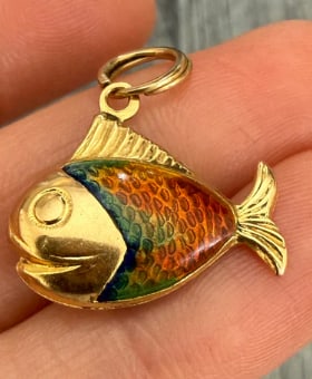 Enamel and 18K Gold Puffy Fish Charm: Vibrant marine life charm cast in a rounded, puffy 3D fish profile, coated in brilliant stripes of hand-applied turquoise-blue and orange glass enamel. Finely detailed fins. Dimensions: 16 mm long x 1