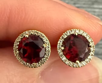 Garnet and Diamond Halo Stud Earrings: Classic round cluster post earrings featuring deep crimson red natural garnets (approx 1.20 ctw) halo-bordered by a crisp frame of tiny brilliant cut diamonds set in 14K yellow gold wire baskets. Oute