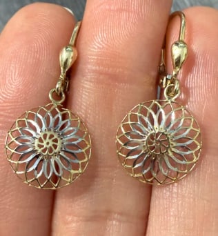 Two Tone 10K Gold Dangling Mandala Earrings: Bohemian style drop earrings featuring large, openwork lace concentric mandala disks detailed with diamond-cut white gold accents over a yellow gold base ring dangling from fishhook wires. Total drop 