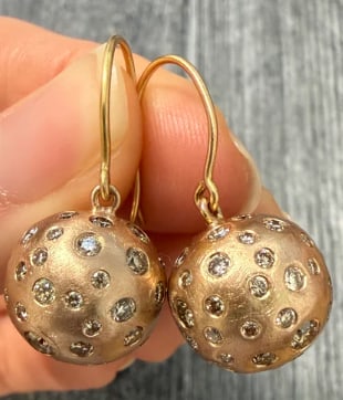 LJ Cross Diamond Etoile and 14K Rose Gold Ball Dangle Earrings: Luxury high-fashion statement post earrings by designer LJ Cross. Long delicate bar drops hanging substantial high-polish 14K rose gold orbs entirely studded with flush starry starburst-set brilliant 