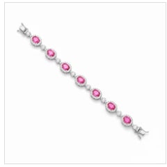 18k Pink Sapphire Bracelet: Spectacular ultra-luxury statement bracelet in 18K yellow gold, completely channel-set with a continuous, vibrant line of perfectly matched cushion-cut natural pink sapphires (approx 14.50 ctw).
