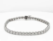 14k Diamond Bracelet: Substantial 14K yellow gold flexible multi-row brick-link fashion bracelet, beautifully centered with an inset white gold plate holding columns of pave-set fiery diamonds. Width: 10 mm; length: 7.0