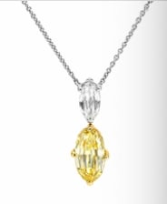 Platinum Fancy Intense Yellow Diamond Necklace: A colossal high-jewelry investment piece. Features a magnificent, certified pear-cut Fancy Intense Yellow diamond pendant centerpiece (approx 2.50 cts) radiating from a heavy platinum collar chain