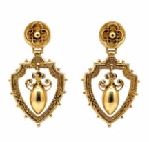 14k Edwardian Period Earrings: Authentic antique turn-of-the-century filigree drop earrings in 14K yellow gold with white gold topped fronts. Showcases fine open lace-work openwork galleries centering two old-mine cut sparkling dia