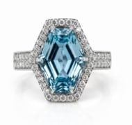 Santa Maria Aquamarine Ring: Exceptional investment-grade ring featuring an authenticated, intensely saturated emerald-cut Santa Maria blue aquamarine (approx 5.20 cts), flanked on both shoulders by staggered steps of baguette an