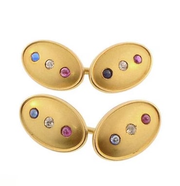 Patriotic Victorian 14K Gold, Diamond, Ruby & Sapphire Cufflinks: Historic late-Victorian era double-faced cufflinks meticulously cast in 14K yellow gold. Each oval plaque face plate is expertly flush-set with a central old-mine cut diamond, accented symmetrically b