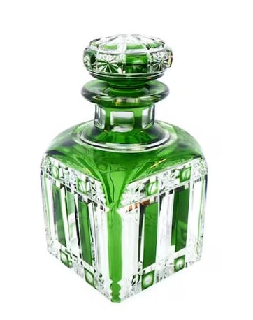 Cristal Nancy Green Overlay Cut Crystal Perfume Bottle: Exquisite antique French art crystal vanity bottle produced by Cristal Nancy. Crafted with a brilliant emerald green casing overlaid on clear crystal, meticulously hand-cut with deep geometric vertica