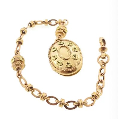 French Victorian 18K Colored Gold Miniature Locket Watch Fob & Chain: Rare late-Victorian era French export masterpiece. Composed of an elaborate 18K yellow and rose gold chain holding a heavy circular locket pocket-watch style medallion frame, decorated with intricate 