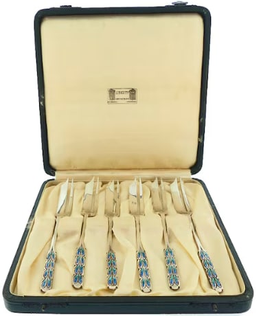 Boxed Set Liberty & Co. Sterling Silver Bernard Cuzner Enameled Pastry Forks: Highly collectible museum-tier British Arts & Crafts sterling silver flatware. A complete matching set of six pastry dessert forks manufactured by Liberty & Co. from a design by iconic silver artist B