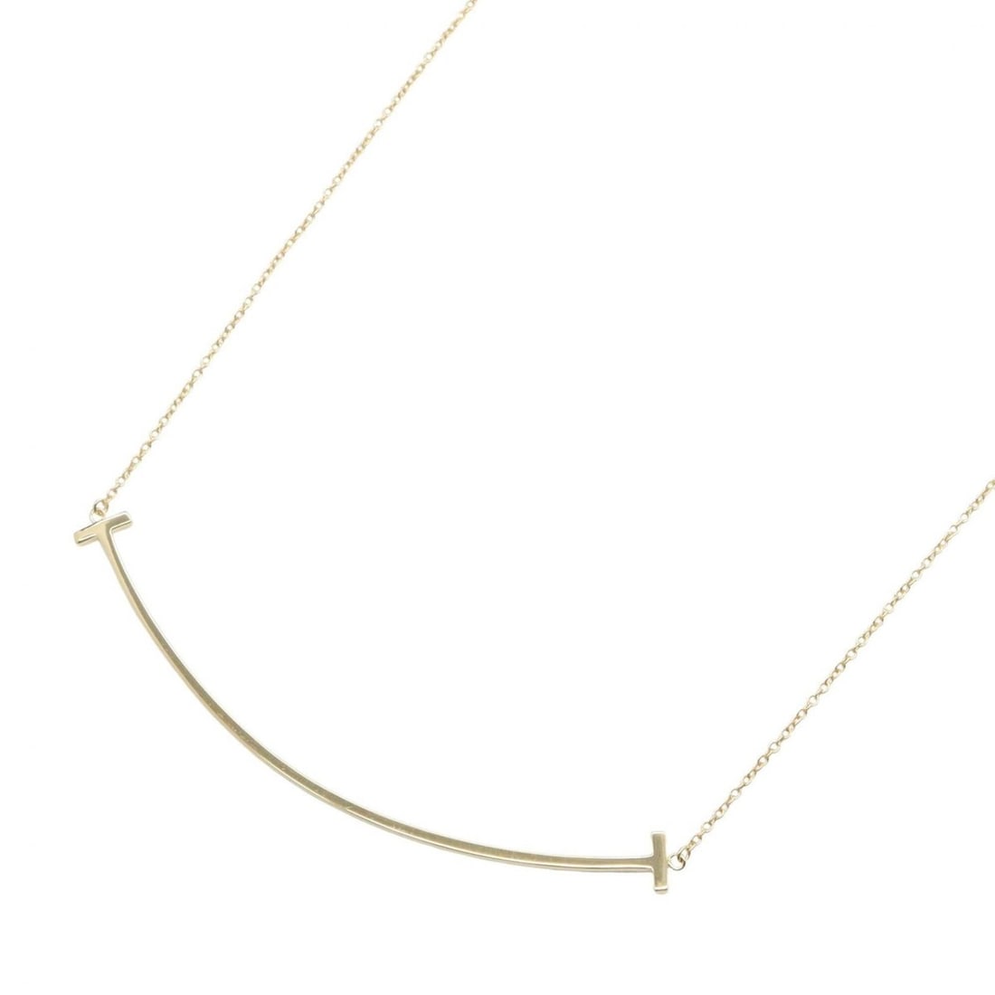 Tiffany & Co. T Smile Large Necklace, 18K (Yellow Gold), Women's Jewelry, Gold Tone: --- Catalog ---Category: SizePendant Size: 5mm x 67mm / 0.19'' x 2.63''Neck Circumference: 40.5 cm - 45.5 cm / 15.94'' - 17.91''Category: DesignColor: GoldGender: WomenMaterial: Yellow gold (18K)Neckl
