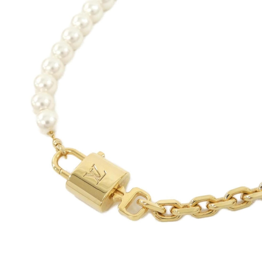 Louis Vuitton Pearl Rock Necklace M02977: --- Catalog ---Category: SizePendant Size: 32mm x 13mm / 1.25'' x 0.51''Neck Circumference: 38 cm / 14.96''Category: DesignColor: Gold, WhiteGender: WomenNecklace Type: NecklaceCategory: GeneralMPN: