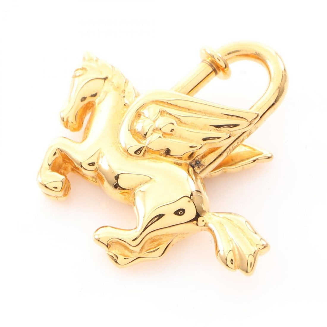 Hermes Cadena Charm Pegasus 1993 Limited Edition Accessory GP Women's Gold Tone: --- Catalog ---Category: DesignType: Handbag charmColor: GoldGender: WomenMaterial: Gold platingCategory: GeneralBrand: Hermes--- Item List ---Section: ConditionRanking: Rank A Used - A few traces of 