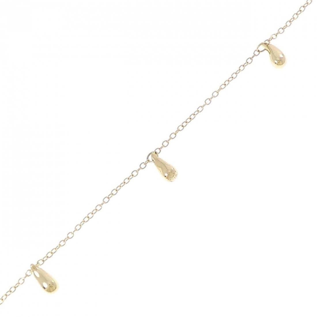 Tiffany & Co. Teardrop x 3 Bracelet: --- Catalog ---Category: SizeWidth: 1.07cm / 0.42''Weight: 4.1g / 0.14oz.Total Length: 18cm / 7.08''Category: DesignType: Charm braceletMaterial: Yellow gold (18K)Category: GeneralBrand: Tiffany---