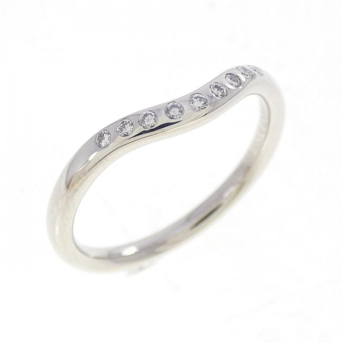 Tiffany & Co. Curved 9P Ring: --- Catalog ---Category: SizeJP Size: 7.5US Size: 4Category: DesignType: Band ringStone: DiamondGender: WomenMaterial: Platinum 950Category: GeneralMPN: 60016941Brand: Tiffany--- Item List