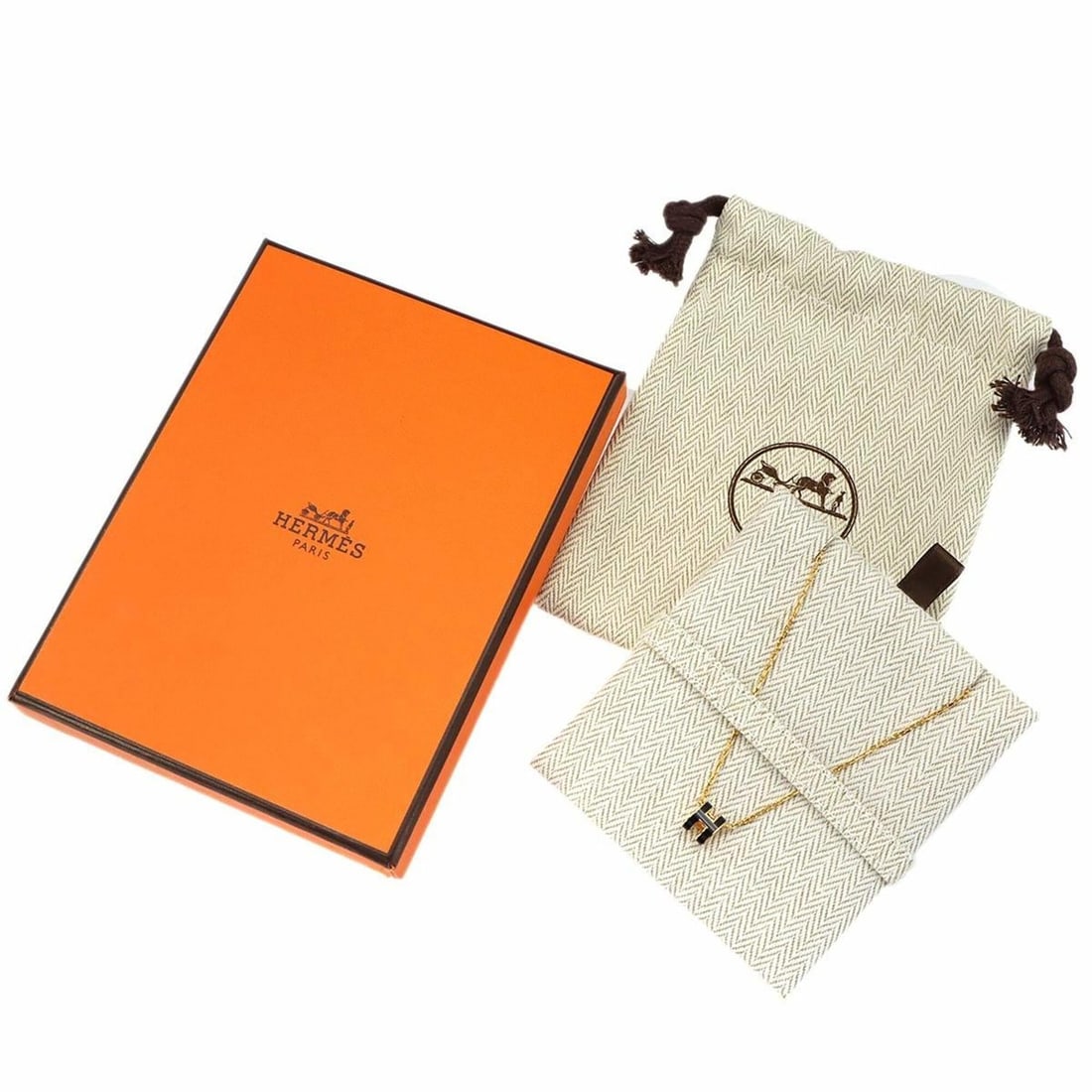 Hermes Mini Pop H Necklace, Black and Gold: --- Catalog ---Category: SizePendant Size: 9mm x 7mm / 0.35'' x 0.27''Neck Circumference: 40.3 cm / 15.86''Category: DesignColor: Black, GoldGender: WomenNecklace Type: NecklaceCategory: