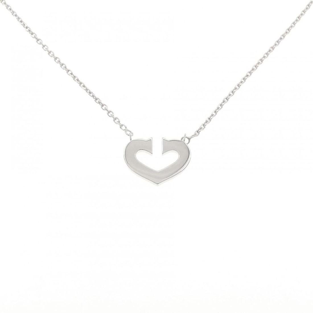 Cartier C Heart Necklace: --- Catalog ---Category: SizePendant Size: 12.3mm x 16.7mm / 0.48'' x 0.65''Neck Circumference: 40 cm / 15.74''Category: DesignColor: White goldGender: WomenMaterial: White gold (18K)Pendant Type: