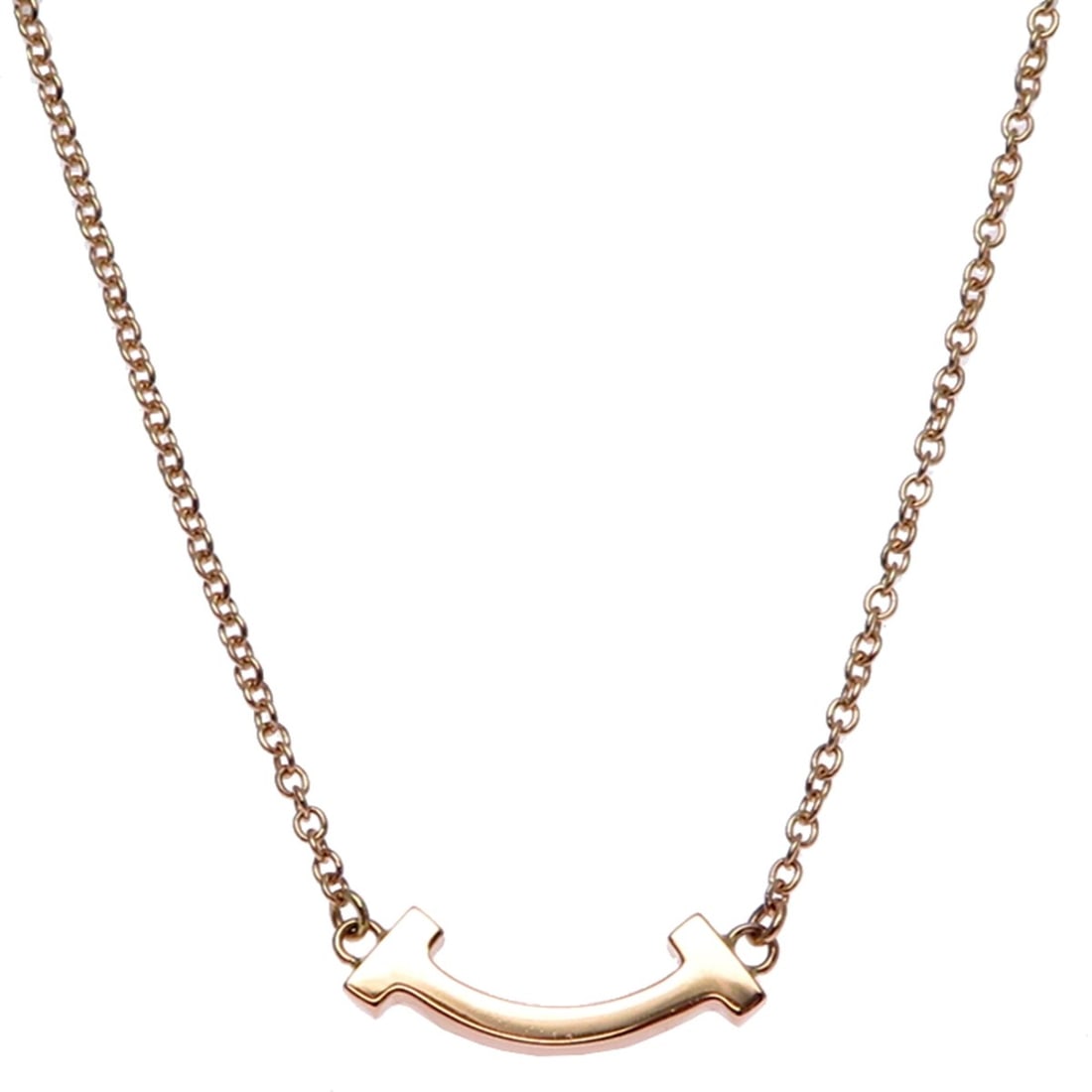 Tiffany & Co. T Smile Mini Women's Necklace, 750 Pink Gold: --- Catalog ---Category: SizePendant Size: 4.6mm x 13.3mm / 0.18'' x 0.52''Neck Circumference: 45 cm / 17.71''Category: DesignGender: WomenMaterial: Pink gold (18K)Necklace Type: NecklaceCategory: Gen