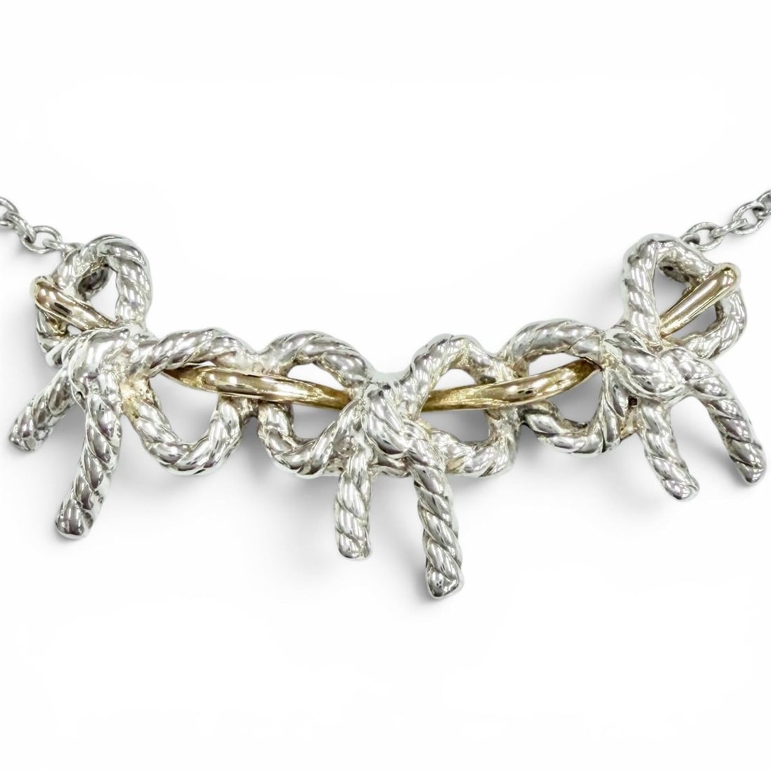 TIFFANY&Co. Tiffany Triple Ribbon Combination Necklace, 925/750 Sterling Silver and Gold, Weight: --- Catalog ---Category: SizePendant Size: 14mm x 35mm / 0.55'' x 1.37''Neck Circumference: 41 cm / 16.14''Category: DesignGender: WomenMaterial: Silver 925, Yellow gold (18K)Necklace Type: