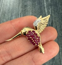Ruby and Diamond Hummingbird Pin and Pendant (S): Versatile hummingbird piece set with rubies and diamonds; can be worn as a pin or pendant.