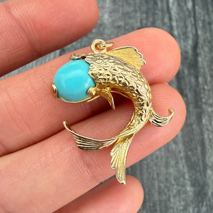 Turquoise and 14k Gold Fish Charm (S): 14K gold fish-shaped charm accented with turquoise detailing.