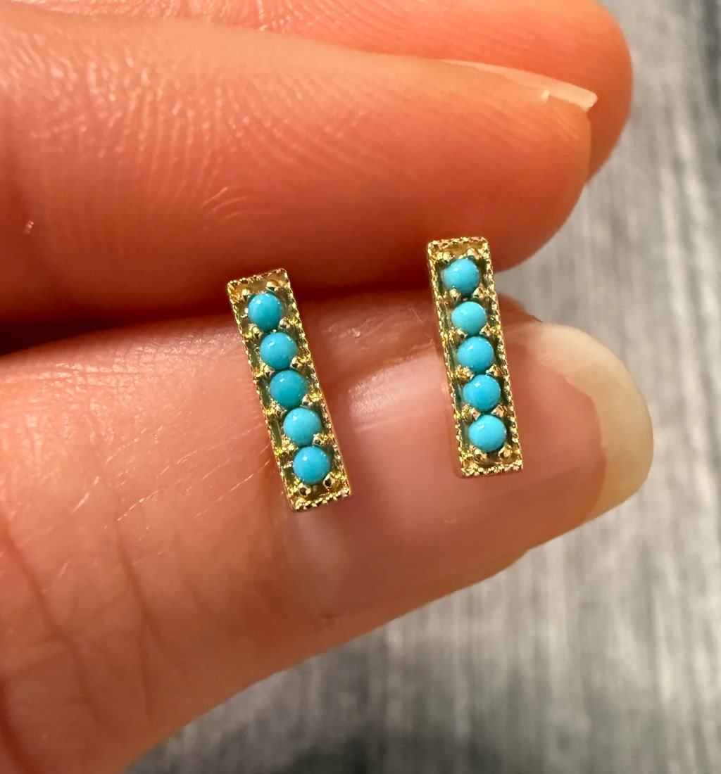 Turquoise and 14K Gold Bar Stud Earrings: Metal: 14K Yellow Gold Weight: 1.5 gramsMeasurements: 0.4 inches long by 0.2 inches wideMarkings: "14K"Condition: In very good condition with some minor surface wear.