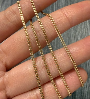 Vintage 14K Gold Flat Curb Link Chain: A classic 18.5" long flat curb link chain in solid 14K yellow gold with a high-polish finish.