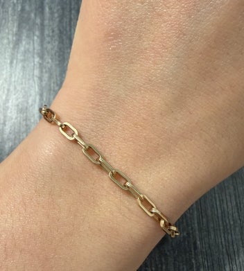 Vintage 14K Rosy Gold Biker Link Bracelet: A substantial 7.5" long bracelet in 14K rosy-yellow gold featuring chunky, biker-style links.