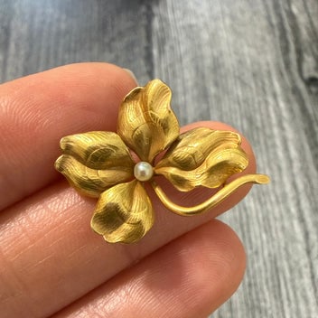 Art Nouveau Whiteside and Blank 14K Clover Pin: An exquisite 14K gold clover pin featuring delicate enamel work and a central seed pearl.