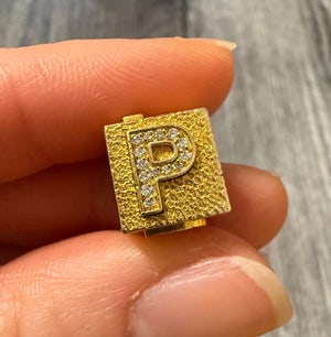 Diamond and 14K Gold Initial "P" Cube Slider Charm: A heavy 14K gold block or cube-shaped slider charm featuring a diamond-encrusted letter "P".