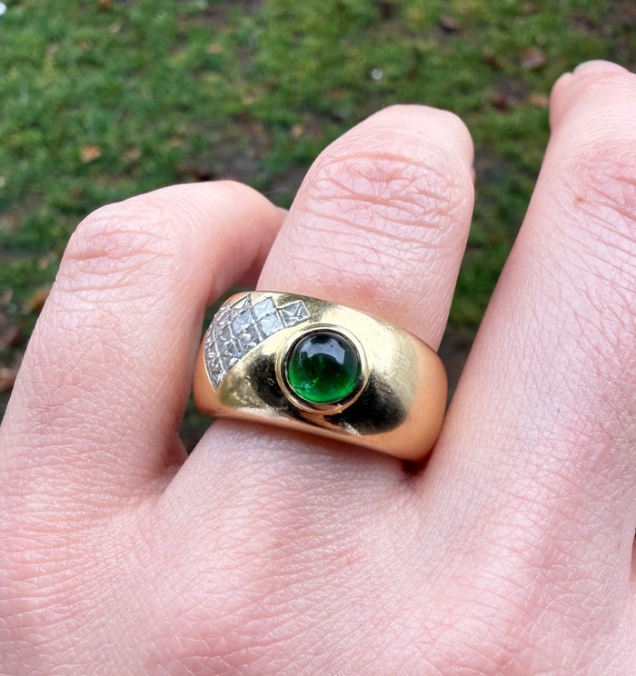 Wide Cabochon Emerald and Diamond Geometric Band: A substantial 14K gold band featuring a large cabochon emerald centered in a diamond-set geometric frame.