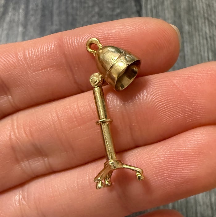 Vintage 14K Gold Articulated Hair Dryer Charm: A rare and whimsical 14K gold charm with moving parts, detailed to look like a vintage salon hair dryer.