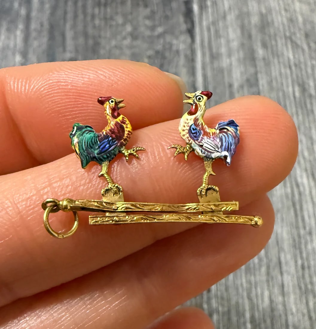 French Antique Enamel and 18K Gold Movable Fighting Rooster Charm: Metal: 18K Yellow Gold Weight: 1.8 gramsMeasurements: 1 inch long by 0.75 inches wideMarkings: French eagle head
