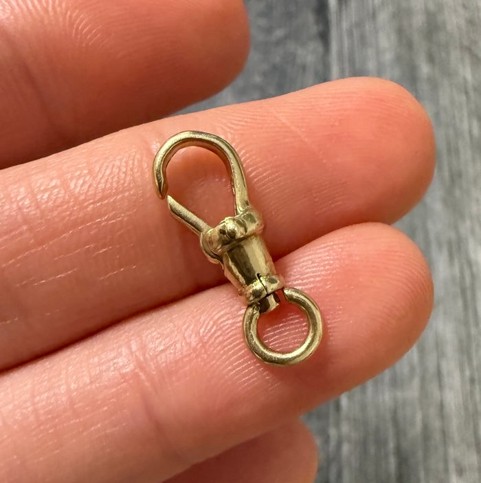 14K Gold Swivel Dog Clip: Functional 14K gold swivel clip, often used for jewelry styling.