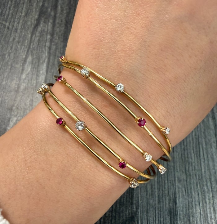 Multi Row Wire Cuff Bracelet with Diamonds and Rubies (S): Multi-row wire cuff in gold set with diamonds and rubies.