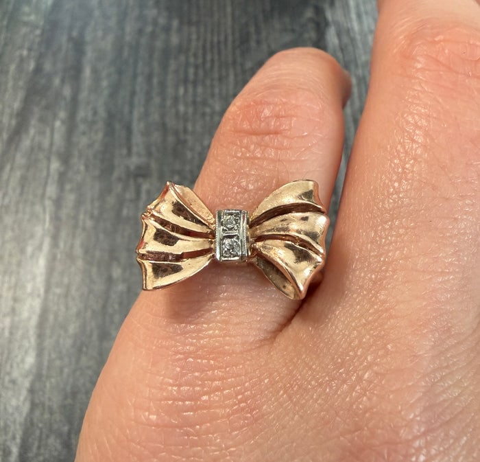 Retro Diamond Bow Ring in 14K Gold: 14K gold ring with a retro bow design and diamond accents.